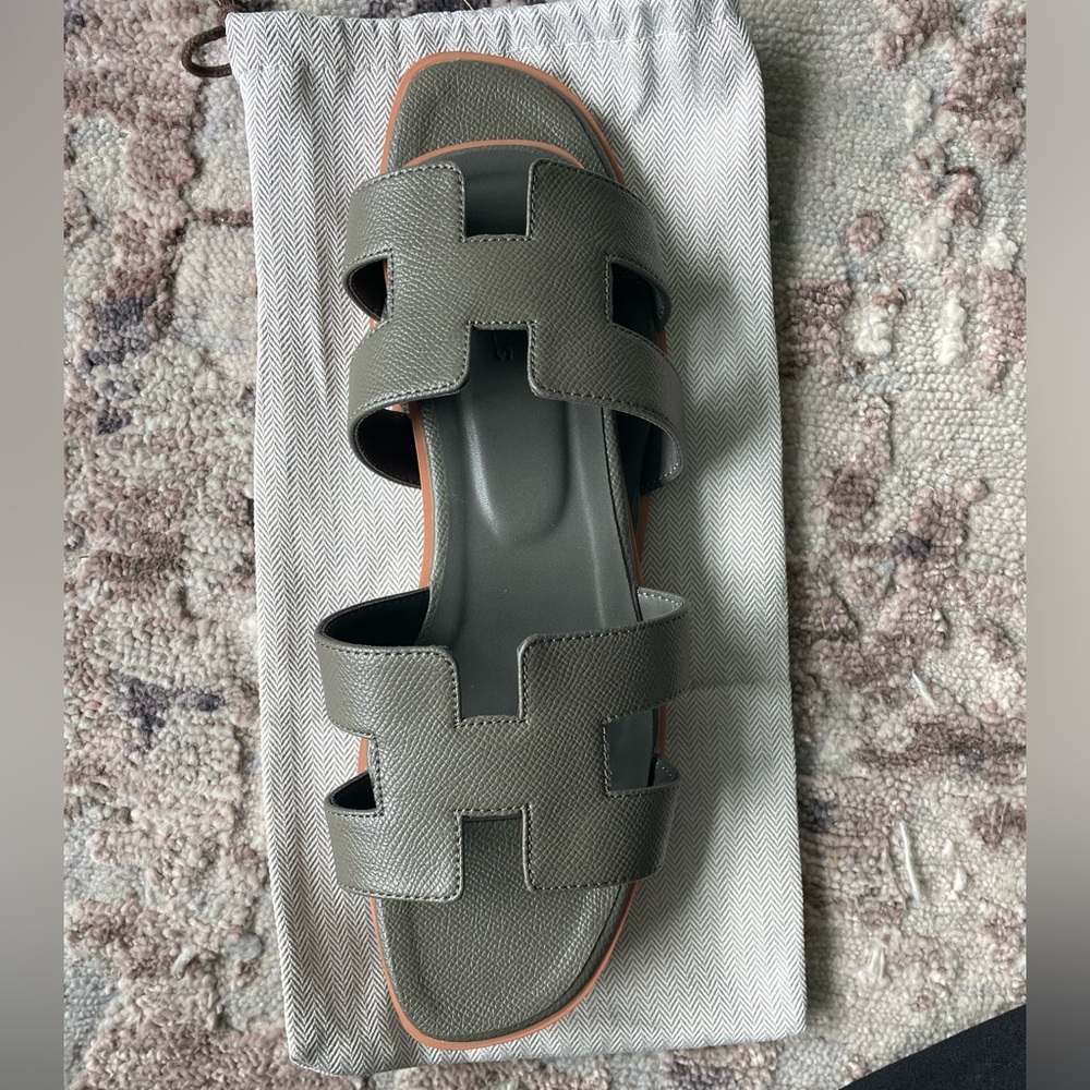 “H” inspired sandals. Dark grey